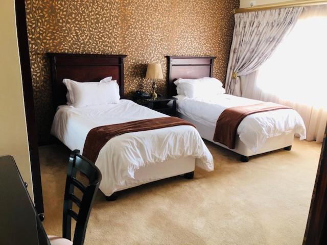Ekupholeni Garden Villas Манзини Экстерьер фото